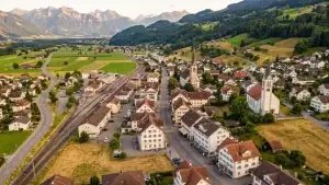Siebnen SZ mit Bahnhof Siebnen-Wangen und Kirchen aus der Luft